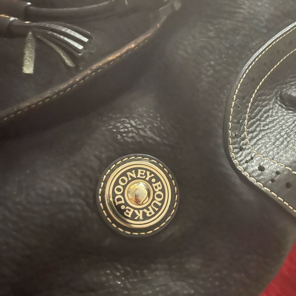 Black Dooney Shoulder Bag  with Duster Bag.  Currently spring cleaning.